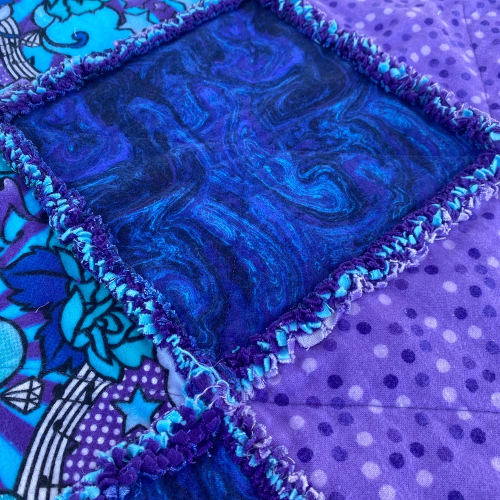 Rag Quilt throw in Purple/Blue made by Farmhouse & Wood. Wild out-of-stock print